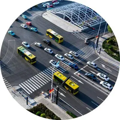 Intersection with cars, bus and other vehicles